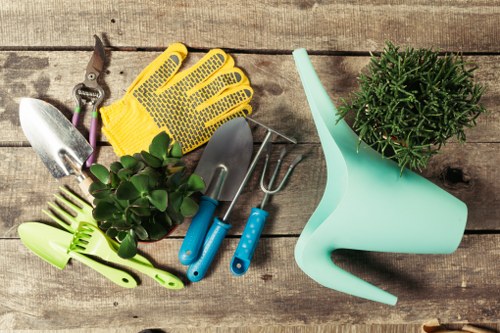 Garden maintenance in Isleworth with tidy lawn and trimmed borders